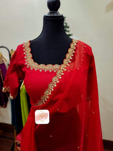 Organza saree with scallop embroidery borders paired with scallop neckline blouse- Blood Red