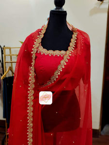 Organza saree with scallop embroidery borders paired with scallop neckline blouse- Blood Red