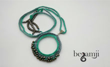 Load image into Gallery viewer, Orb Cyan Set of Earrings and Necklace
